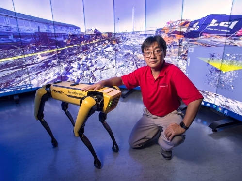 Civil Engineering associate professor and robotic dog