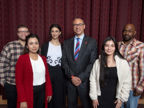 President Jonathan Holloway poses with students at the inaugural Rutgers Summer Service Internship program (RSSI) Kickoff Event held at the College Avenue Campus Center